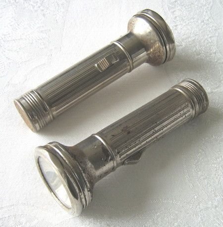two-vintage-empire-made-plated-metal-torches-c1930s-50s-sold--8676-p_zps4b7c122c.jpg.b40e8deefa18d87c6c6d009c9856acef.jpg